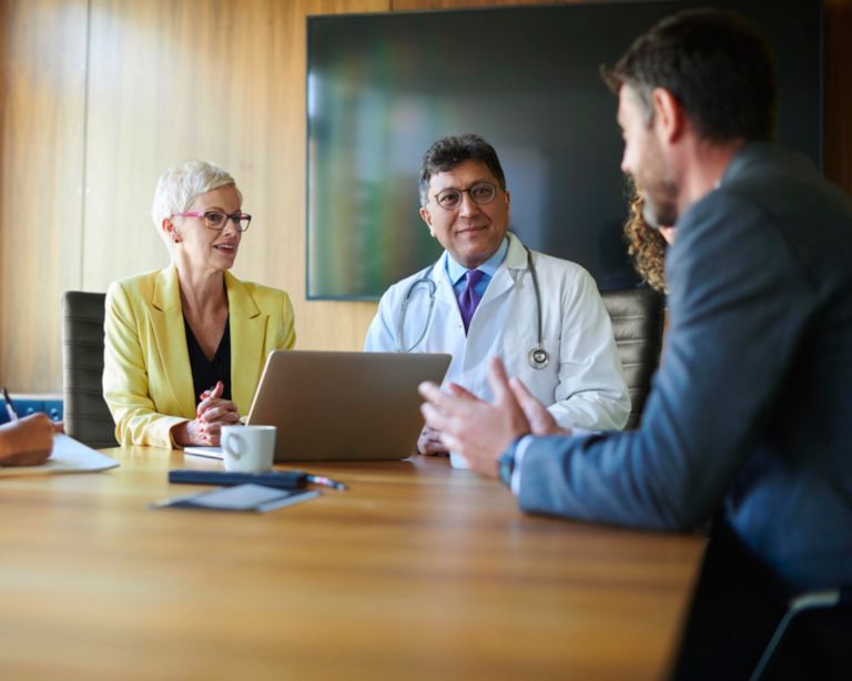 Group of clinicians and biomed consulting